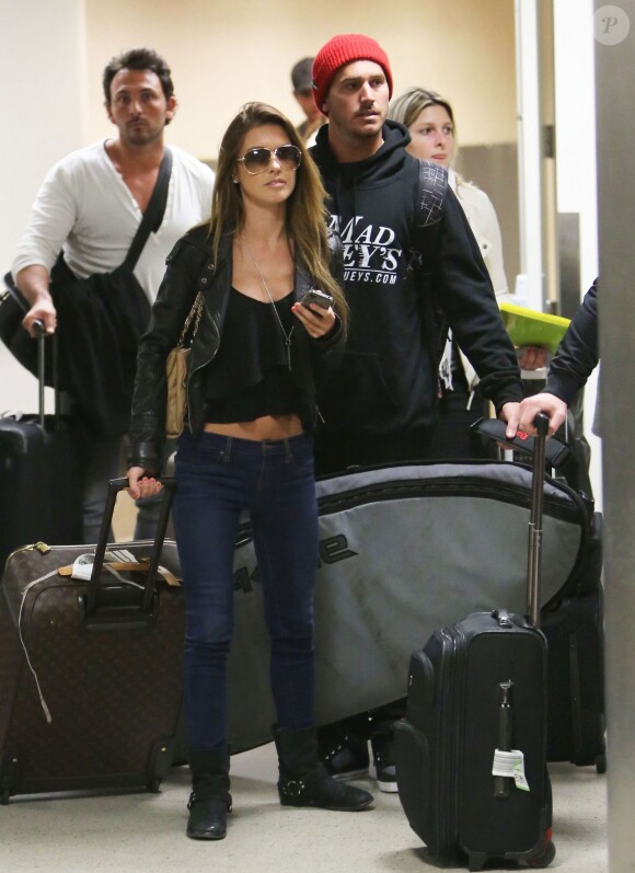 Audrine Patridge et son compagnon Corey Bohan arrivent a l'aeroport LA de Los Angeles. Le 5 janvier 2013