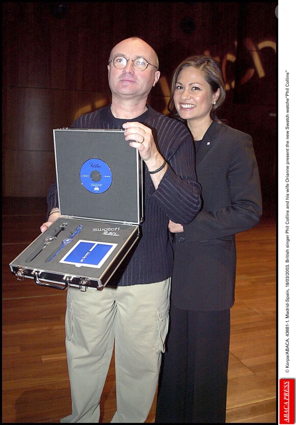 Phil Collins et sa femme Orianne lors de la présentation de la nouvelle Swatch, le 20 mars 2003 à Madrid © Korpa/ABACA.