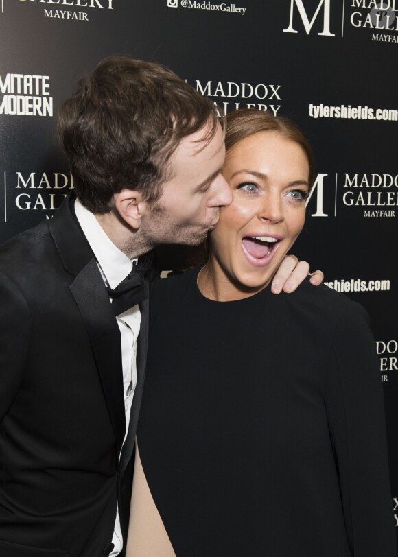 L'artiste photographe Tyler Shields et Lindsay Lohan assistent au vernissage de l'exposition "Decadence" à la Maddox Gallery. Londres, le 3 février 2016.
