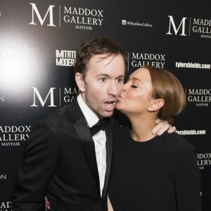 L'artiste photographe Tyler Shields et Lindsay Lohan assistent au vernissage de l'exposition "Decadence" à la Maddox Gallery. Londres, le 3 février 2016.