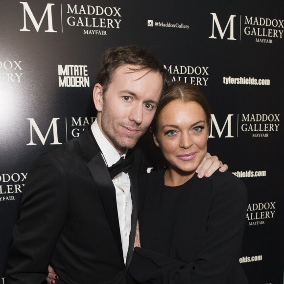 L'artiste photographe Tyler Shields et Lindsay Lohan assistent au vernissage de l'exposition "Decadence" à la Maddox Gallery. Londres, le 3 février 2016.