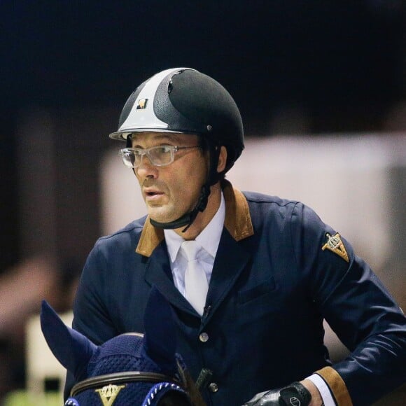 Julien Courbet, au Jumping International de Bordeaux, le 6 février 2016. Julien et sa fille Lola Courbet montent pour leur partenaire Victory Horse. © Thibaud Moritz/Quentin Salinier