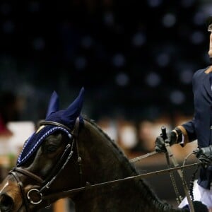 Julien Courbet, au Jumping International de Bordeaux, le 6 février 2016. Julien et sa fille Lola Courbet montent pour leur partenaire Victory Horse. © Thibaud Moritz/Quentin Salinier