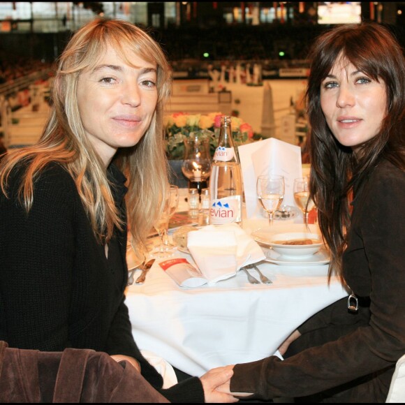Mathilde Seigner et Valérie Guignabodet au Salon du Cheval 2006.