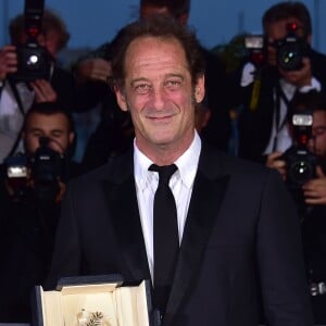 Vincent Lindon (prix d'interprétation masculine pour le film "La Loi du Marché") - Photocall de la remise des palmes du 68ème Festival du film de Cannes, le 24 mai 2014.