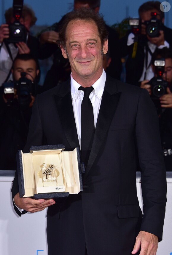 Vincent Lindon (prix d'interprétation masculine pour le film "La Loi du Marché") - Photocall de la remise des palmes du 68ème Festival du film de Cannes, le 24 mai 2014.