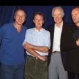 Mark Knopfler, George Martin, Paul McCartney et Sting à Londres en septembre 1997.