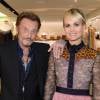 Exclusif - Johnny Hallyday et sa femme Laeticia Hallyday - Le joaillier Aaron Jah Stone et l'artiste Kongo ont présenté une nouvelle collection qui allie street art et joaillerie chez Montaigne Market à Paris le 4 mars 2016.