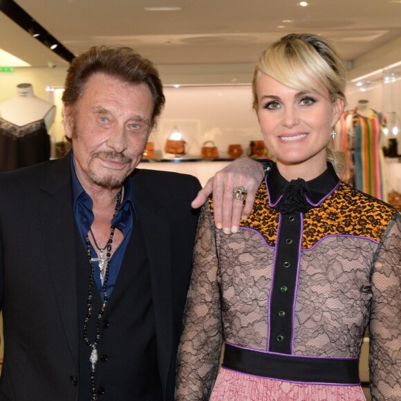 Exclusif - Johnny Hallyday et sa femme Laeticia Hallyday - Le joaillier Aaron Jah Stone et l'artiste Kongo ont présenté une nouvelle collection qui allie street art et joaillerie chez Montaigne Market à Paris le 4 mars 2016.