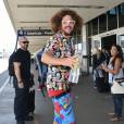 Redfoo du groupe "LMFAO" arrive à l'aéroport LAX de Los Angeles. Le 5 août 2015