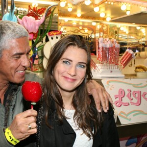 Samy Naceri et sa compagne Marie - Soirée d'ouverture de la Foire du Trône à Paris, le 25 mars 2016.  © Coadic Guirec/Bestimage