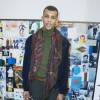 Le chanteur Stromae au défilé de mode hommes Valentino collection prêt-à-porter Automne Hiver 2015/2016 à l'hôtel Salomon de Rothschild à Paris, le 21 janvier 2015