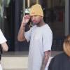 Le rappeur Tyga fait du shopping avec des amis chez Barney New York à Beverly Hills le 20 Mars 2016.