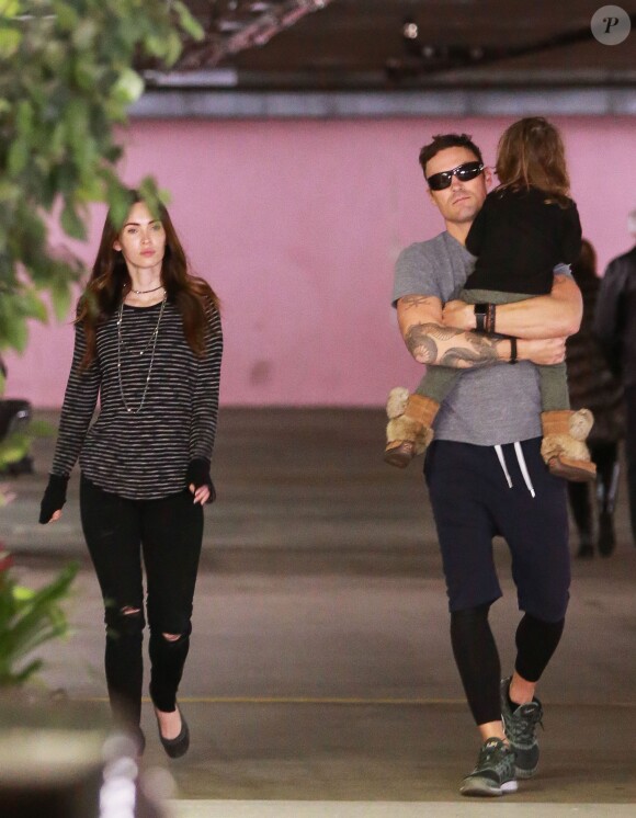 Megan Fox et Brian Austin Green, accompagnés de leur fils Noah, à la sortie d'un hôpital de Los Angeles le 21 janvier 2016