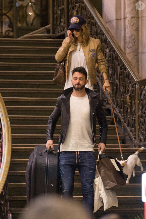 Après s'être rendue au Boohoo store pour une inauguration et une rencontre avec ses fans , Nabilla Benattia qui porte une casquette avec inscrit dessus prison arrive Gare de Lyon avec son chien pour aller au restaurant "Le Train Bleu". Thomas Vergara arrive 5 minutes plus tard au restaurant puis ils repartent ensemble (Thomas avec la casquette de Nabilla et Nabilla avec les lunettes de Thomas) pour prendre un TGV pour Aix-en-Provence le 8 avril 2016 08/04/2016 - Paris