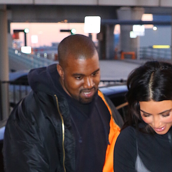Kanye West et sa femme Kim Kardashian arrivent à l'aéroport JFK à New York pour prendre un avion. Le 16 avril 2016 © CPA / Bestimage