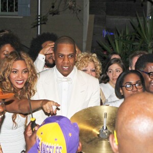 Beyoncé et son mari Jay-Z à la fête du mariage de Solange Knowles et Alan Ferguson sur le thème de "Mardi Gras" dans le quartier français de la Nouvelle-Orléans, le 16 novembre 2014.