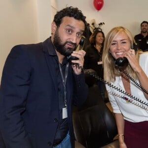 Cyril Hanouna et Enora Malagré - 11e édition du "BGC Charity Day" à Paris le 11 septembre 2015 en mémoire aux 658 collaborateurs du groupe BGC partners (leader mondial du courtage interbancaire) disparus il y a 14 ans dans les attentats du World Trade Center le 11 septembre 2001.