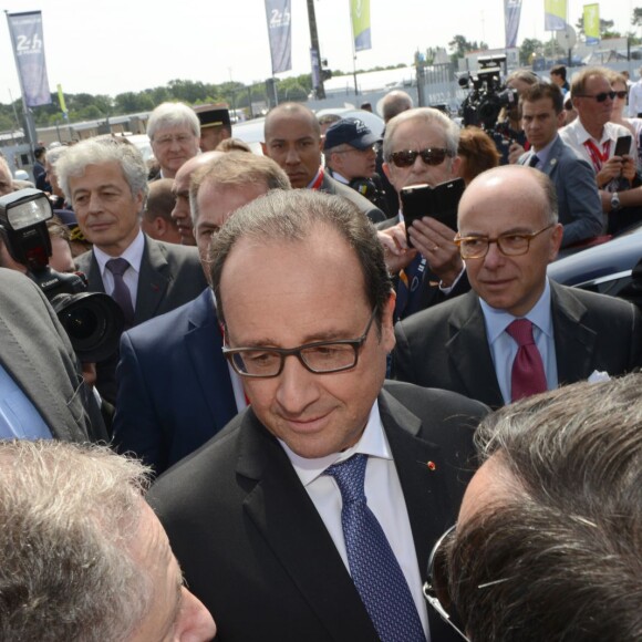 Stephane LeFoll et Francois Hollande lors des 83e 24 Heures du Mans, le 13 juin 2016.