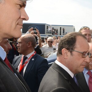 Stephane LeFoll et Francois Hollande lors des 83e 24 Heures du Mans, le 13 juin 2016.