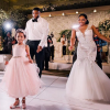 Devon Still, défenseur en NFL sous contrat avec les Houston Texans, a célébré le 13 mai 2016 son mariage avec Asha Joyce, en présence de sa fille Leah, survivante du cancer, ici tous les trois en pleine chorégraphie sur Uptown Funk à la Bibliothèque nationale de New York.