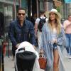 Chrissy Teigen, son mari John Legend et leur fille Luna en poussette à New York. Le 14 mai 2016.