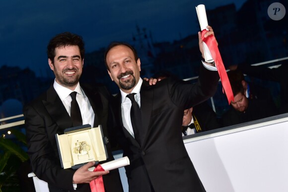 Shahab Hosseini (Prix d'interprétation masculine dans "Le Client "d'Asghar Farhadi), Asghar Farhadi (Prix du scénario pour "Le Client") - Photocall de la remise des palmes du 69ème Festival International du Film de Cannes. Le 22 mai 2016. © Giancarlo Gorassini/Bestimag