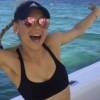 Anna Kournikova en pleine danse sur la chanson "Duele el corazon" d'Enrique Iglesias.