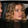 Johnny Depp et sa femme Amber Heard rentrent à leur hôtel après la première du film Black Mass à Londres, le 11 octobre 2015.