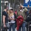 Exclusif - Nabilla Benattia et son compagnon Thomas Vergara sont attendus par une équipe de TF1 alors qu'ils arrivent à la gare de Lyon avec leur chienne Pita à Paris, le 26 mai 2016.