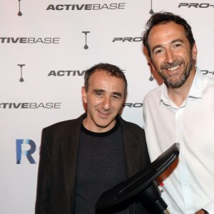 Exclusif - Claude Ceard (directeur marketing Europe Proform), Elie Semoun - Soirée pour le lancement de l'accessoire fitness Active Base de la marque Proform (une entité de ICON Health & Fitness, la première marque américaine de fitness à domicile) au restaurant Il Cottage à Paris, le 31 mai 2016. © Rachid Bellak/LMS/Bestimage