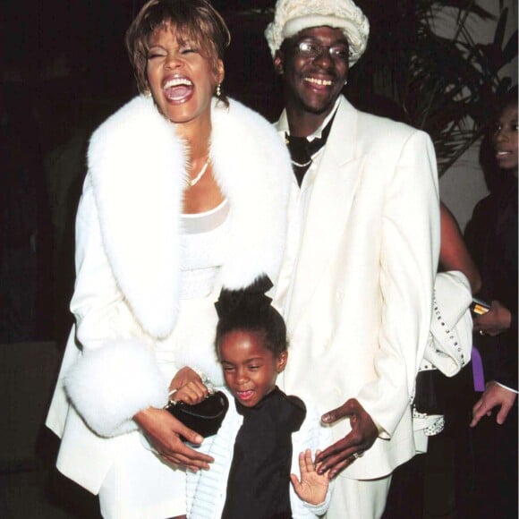 Whitney Houston et son mari Bobby Brown ainsi que leur fille Bobbi Kristina à Los Angeles, le 12 octobre 1998  998 -