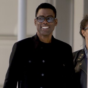 Chris Rock et sa compagne Megalyn Echikunwoke sont allés faire du shopping chez "Barneys New York" avant de prendre un taxi sur la 5ème avenue à New York, le 15 avril 2016.