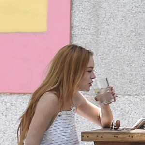 Lindsay Lohan et son compagnon Egor Tarabasov se promènent dans les rues de Madrid. Le 10 juin 2016