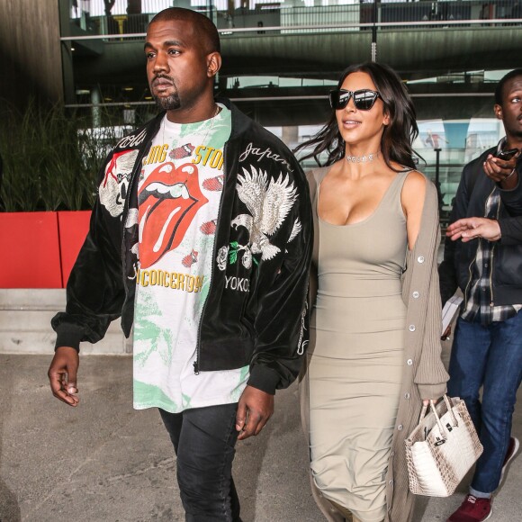 Kim Kardashian et son mari Kanye West arrivent à l'aéroport de Roissy-Charles-de-Gaulle. Roissy, le 13 juin 2016.