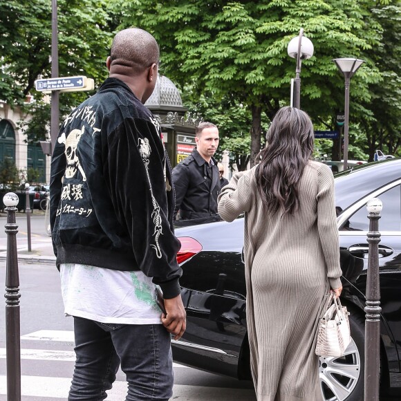 Kim Kardashian et son mari Kanye West arrivent au restaurant "L'Avenue" à Paris, le 13 juin 2016.