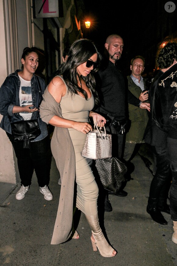 Kim Kardashian et Kanye West quittent le studio photo L7. Paris, le 13 juin 2016.
