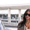 Kim Kardashian et Kanye West quittent Paris pour Los Angeles à l'aéroport de Roissy-Charles-de-Gaulle le 14 juin 2016.