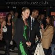 Kate Moss quitte le Ronnie Scott's Jazz Club à l'issue de la soirée "Extravaganza" pour les 10 ans de "The Hoping Foundation". Londres, le 16 juin 2016.
