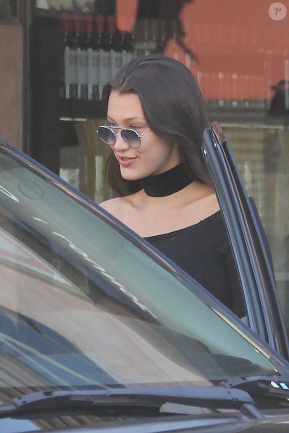 Bella Hadid et son père Mohamed Hadid au restaurant Via Alloro à Beverly Hills. Los Angeles, le 18 juin 2016.