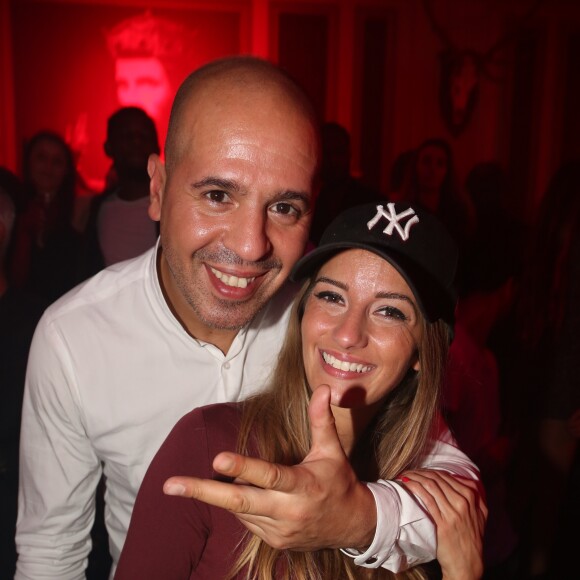 Dj Cut Killer et sa nouvelle compagne Lily à la soirée La Parisienne à l'Heritage, club parisien, le 22 juin 2016.