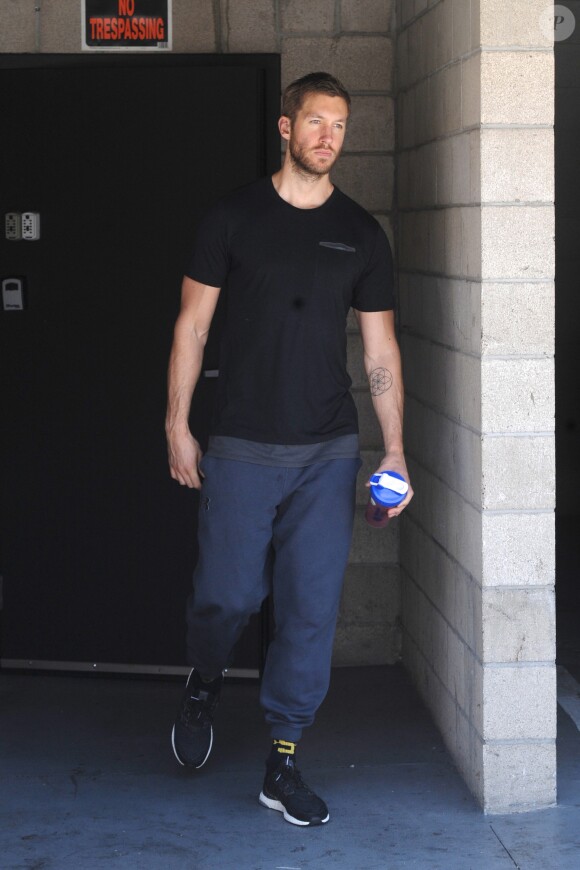 Calvin Harris looks solemn as he leaves the gym with a smoothie in hand. Calvin has been keen to smile for the cameras in the last couple of days, but it seems today he was in no mood as he leaves the gym looking solemn as he gets into his car, in Los Angeles, CA, USA, on June 23, 2016. Photo by GSI/ABACAPRESS.COM24/06/2016 - Los Angeles