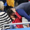 Olivier Giroud et sa compagne Jennifer - Les joueurs retrouvent leur famille dans les tribunes à la fin du match de quart de finale de l'UEFA Euro 2016 France-Islande au Stade de France à Saint-Denis le 3 juillet 2016. © Cyril Moreau / Bestimage
