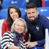 Olivier Giroud avec sa compagne Jennifer - Les joueurs retrouvent leur famille dans les tribunes à la fin du match de quart de finale de l'UEFA Euro 2016 France-Islande au Stade de France à Saint-Denis le 3 juillet 2016. © Cyril Moreau / Bestimage
