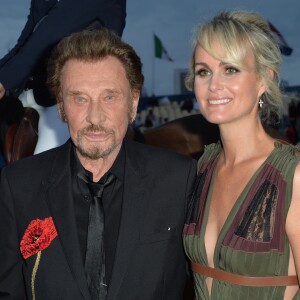 Johnny Hallyday et sa femme Laeticia Hallyday - Remise du Prix Eiffel avec Johnny et Laeticia Hallyday - Record du saut en hauteur de la ville de Paris / EOS - Longines Paris Eiffel Jumping à la plaine de Jeux de Bagatelle à Paris le 1er juillet 2016. Cette remise de prix est le prologue de la soirée au profit de l'association "La bonne étoile" de Laeticia Hallyday. © Olivier Borde / Veeren / Bestimage