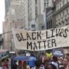 Des milliers de manifestants se sont réunis près du parc Union Square et ont marché jusqu'à Times Square pour réclamer justice au nom d'Alton Sterling et Philando Castile, le 7 juillet 2016 à New York.