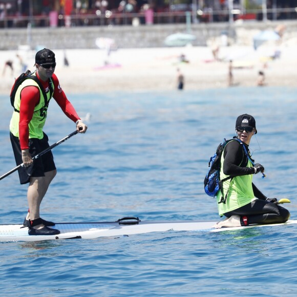 No Tabloïd - Exclusif - La princesse Charlène de Monaco et son frère Gareth Wittstock - La princesse Charlène de Monaco participe à la 2ème Riviera Sup Race, une course de stand up paddle de 14 km organisée par l'association Hoé Hoé qui traverse Monaco, l'Italie, Menton et Roquebrune-Cap-Martin, le 25 juin 2016. Le prince Albert II de Monaco a donné le départ depuis la plage de Larvotto en compagnie de Benjamin Clément, le président de l'association Hoé Hoé. La princesse, qui a participé à cette course "pour le plaisir", était accompagnée par son frère Gareth Wittstock (qui fêtait son anniversaire aujourd'hui et sa seconde participation à l'évènement). Le meilleur des participants a mis 1h41 pour parcourir les 14 km. La princesse a bouclé la course en 2h52min. A son arrivée à la base nautique de Roquebrune-Cap-Martin, elle a été chaleureusement accueillie et félicitée par son mari le prince Albert II de Monaco. © Bruno Bebert - Olivier Huitel/Pool Restreint Monaco/Bestimage-Crystal  No Tabloïd For Germany call for price No web - No blog pour Belgique/Suisse Exclusive - Princess Charlene of Monaco participates at the second "Riviera SUP Race 2016", a Stand Up Paddle board competition that spans three countries - Monaco, Italy and France, with her brother Gareth Wittstock. The long distance race departed from Monaco yesterday and Princess Charlene's husband Prince Albert II of Monaco was there to support his wife and officially launch the race.25/06/2016 - Monaco