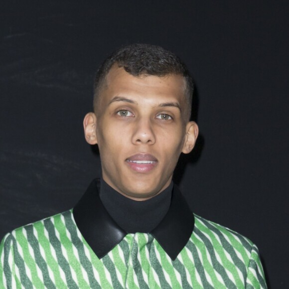 Stromae au défilé de mode "Valentino", collection prêt-à-porter automne-hiver 2015-2016, à Paris. Le 10 mars 2015