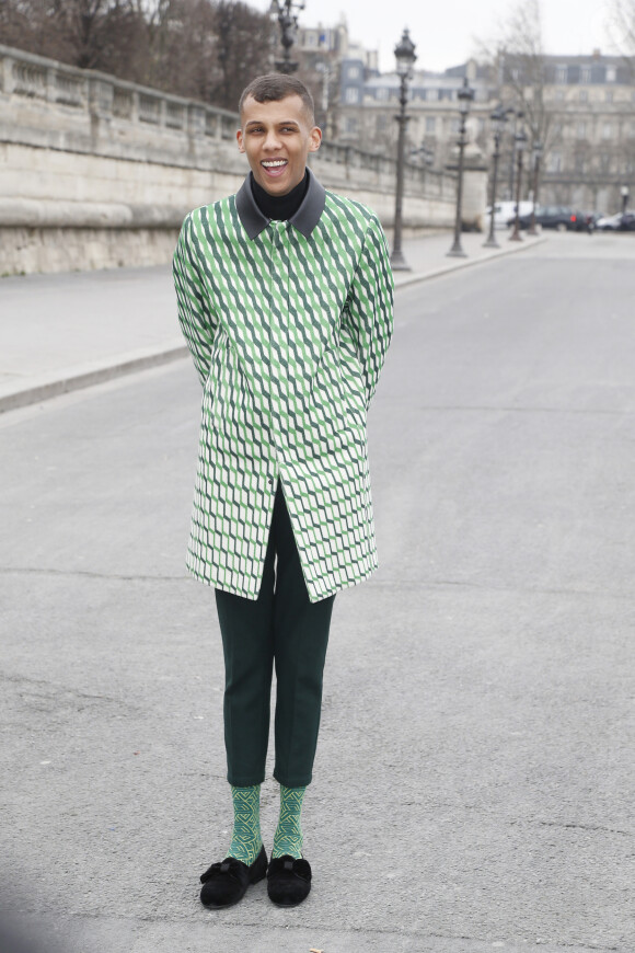 Stromae au défilé de mode "Valentino", collection prêt-à-porter automne-hiver 2015-2016, à Paris. Le 10 mars 2015