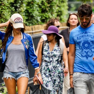 Exclusif - Nabilla Benattia et son compagnon Thomas Vergara déjeunent chez "Pizza Pino" sur les Champs-Elysées et font du shopping sur l'Avenue Montaigne avec leur chien Pita à Paris, France, le 21 juillet 2016. © Agence/Bestimage